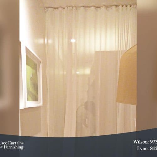 S Fold Curtain or Ripple fold curtain used as room separator or partition.