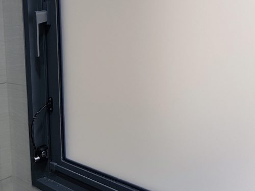 Remsafe cable lock with opaque frosted window film protects privacy.
