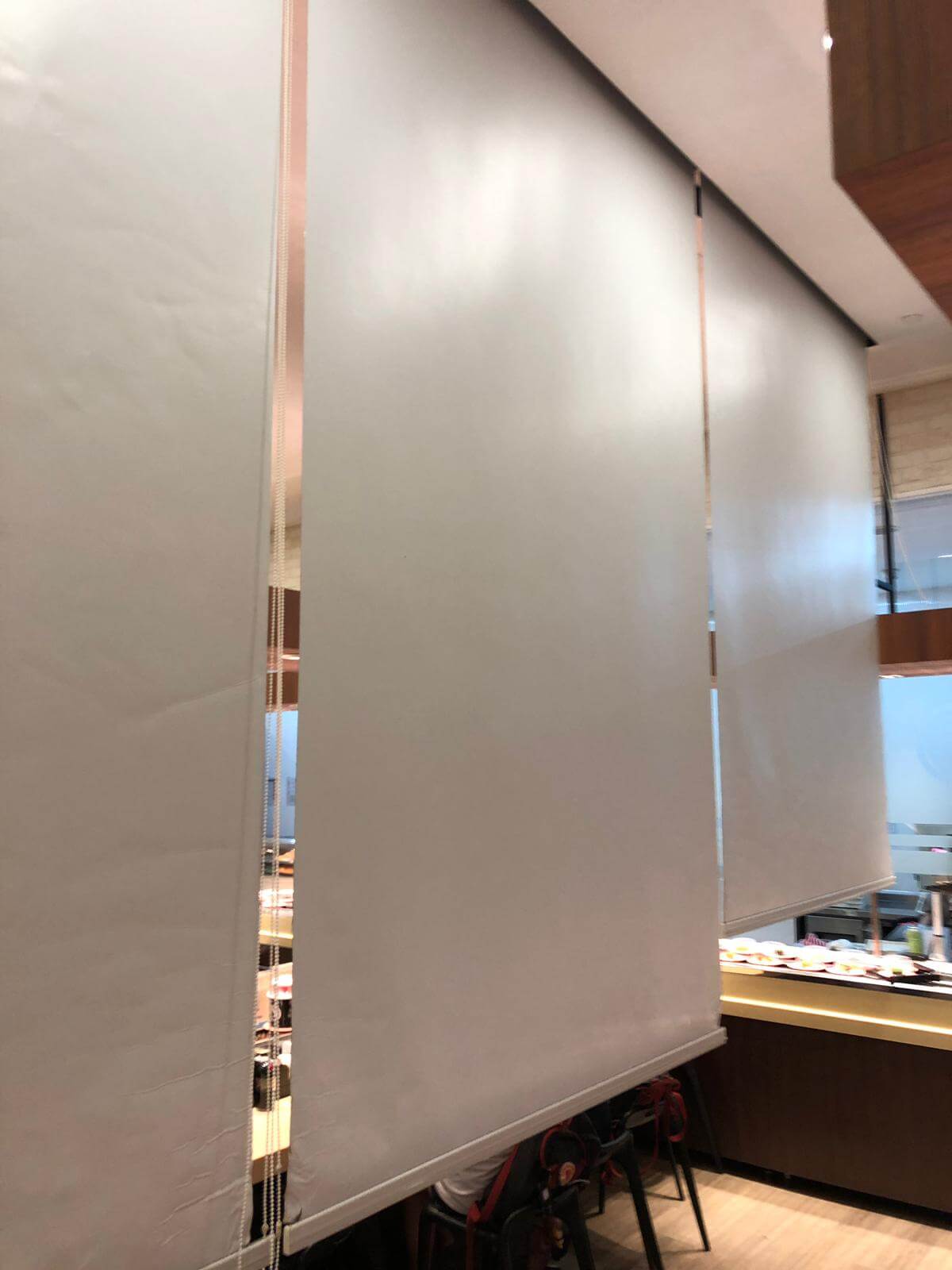 Sushi Express privacy roller blinds in restaurant