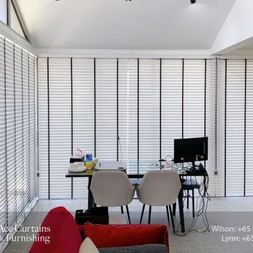 full height white and black venetian blinds